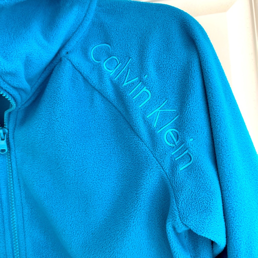Calvin Klein fleece jacket size M.  Like new condition. Teal blue.